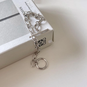 Minimalist 925 sterling silver chain bracelet with classic OT toggle closure on white box