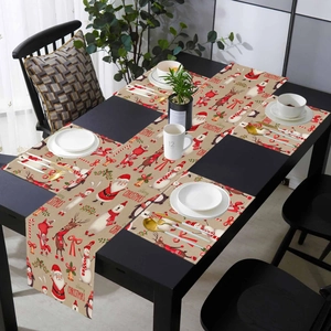 Festive Christmas table runner and placemats set featuring reindeer and Santa cartoon prints