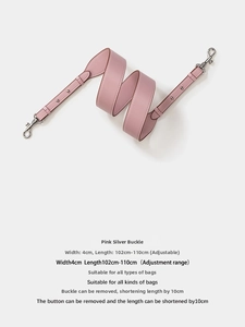 Pink leather shoulder strap detail with silver buckle and adjustable length rivets