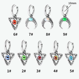 316L stainless steel hoop earrings with moon, evil eye, and celtic knot stone charms