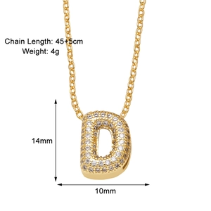 Macro view showing 14mm gold letter D pendant with cubic zirconia and chain size specs