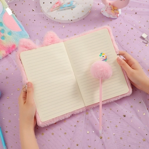 Pink plush A5 cat-themed notebook with unicorn pen on a romantic starry background