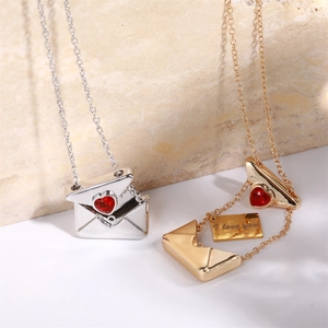 Detail of opening gold and silver envelope necklaces with I Love You hidden message