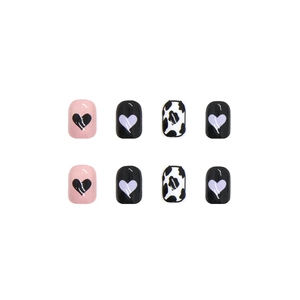 Cute autumn cow print press-on nails with mixed heart patterns in pink and black