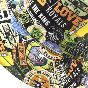 Detailed close-up of high-density canvas fabric with vibrant graffiti and letter print