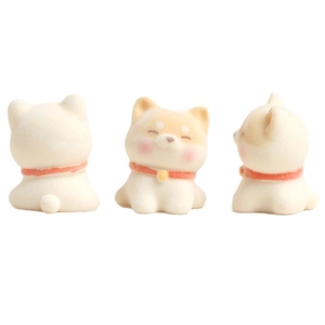 Three cute flocked resin kitten figurines in beige and orange from multiple angles