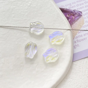 Macro shot of colorful tulip shaped glass beads with iridescent finish for DIY jewelry