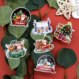 Christmas stickers set with Santa, reindeer and tree on a festive red background