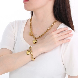 Gold stainless steel heart pendant necklace and bracelet set with toggle clasp