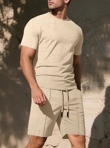 Detail shot of men's apricot leisure set showing the unique 3D jacquard fabric texture