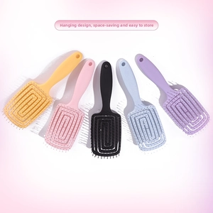 Set of five vented hair brushes in bright yellow, pink, black, blue and purple