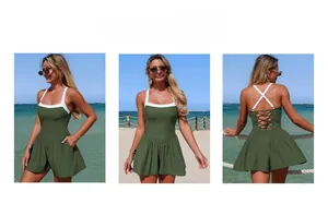 Detail view of army green one-piece swimsuit with contrast straps and crisscross back design