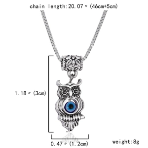 Detailed silver owl pendant with blue evil eye bead and full chain dimensions