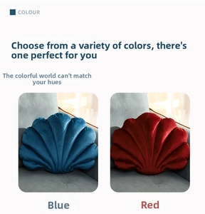 Detailed view of velvet shell-shaped decorative pillows in blue and red colors