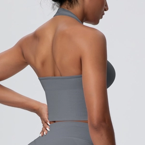 Detail of grey seamless knit sports top with halter neck and ribbed texture