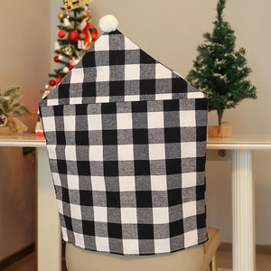Housse de chaise de Noël à carreaux noirs et blancs avec pompon blanc pour déco festive