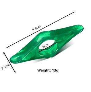 Detail showing dimensions of green resin thumb book holder, size 8.5x3.5cm and 13g weight