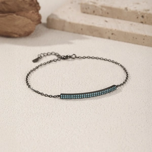 Vintage black S925 silver bracelet featuring a rectangular bar with blue turquoise beads