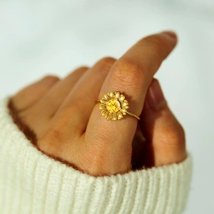 Elegant S925 sterling silver sunflower ring with yellow zircon on a model hand