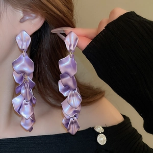 Detailed view of lilac long tassel earrings with layered pearlescent flower petals