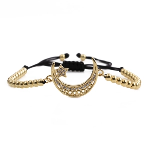 Adjustable gold star and moon bracelet with zircon pavé on black braided cord