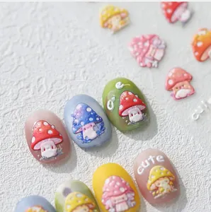Macro shot of 3D embossed mushroom nail stickers with colorful patterns and cute lettering