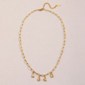 Detail of 18K gold-plated paperclip chain necklace with a LOVE letter pendant