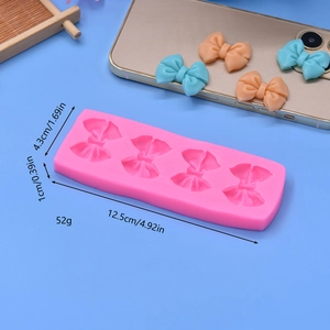Rosa Silikonform mit Schleifenmotiven und Maßen für DIY Fondant und Backen