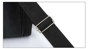 Close-up of adjustable nylon shoulder strap and metal buckle on black oxford bag