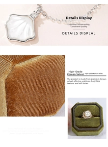Detail view of premium olive green octagonal velvet box with shell pendant and pearl ring
