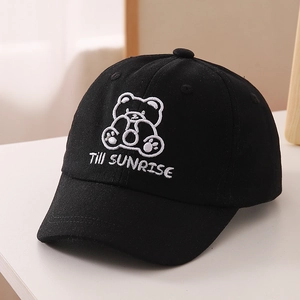 Close-up of black cotton baseball cap with white bear embroidery and Till SUNRISE text
