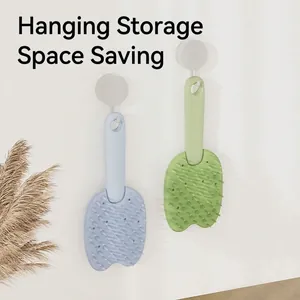 Double-sided cat grooming brush for deshedding and massage with wall-mounted hooks