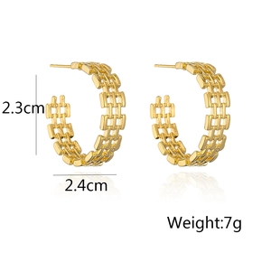 Detail showing 2.3cm by 2.4cm dimensions of gold hollow geometric stud earrings