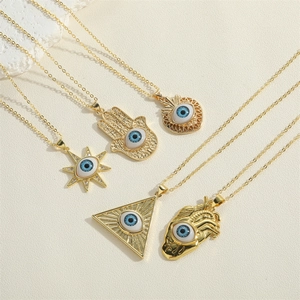 Golden Evil Eye jewelry set with Hamsa Hand heart and triangle pendants on gold chains