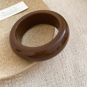 Minimalist wide dark brown resin bangle bracelet with high-polished glossy finish
