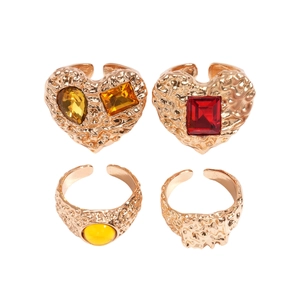 Set of 4 vintage golden geometric open rings with colorful faux gemstones and hammered texture