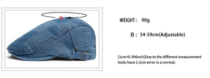 Detail of blue patchwork denim beret showing size 54-59cm and adjustable buckle