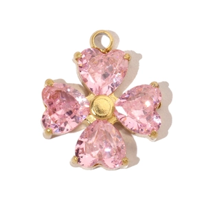 Detailed view of pink heart zircon clover pendant with gold plated stainless steel base