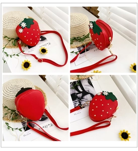 Detailed views of red strawberry crossbody bag for girls showing front and back design