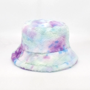 Close-up of soft tie-dye faux rabbit fur texture on a thick winter bucket hat