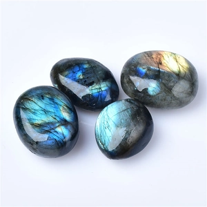 Polished labradorite stones showing vibrant blue and green labradorescence effect