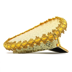 Sparkly gold sequin bride captain hat with amber gemstones and braided embroidery detail