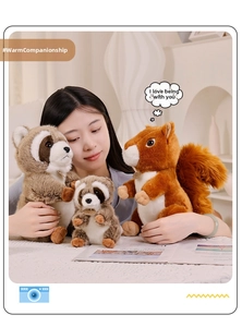 Detailed view of soft plush raccoon and squirrel stuffed animals held by a female model