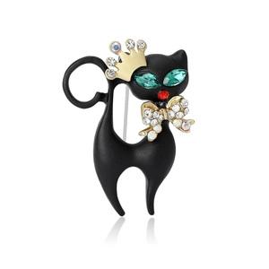 Enamel black cat brooch with gold crown and crystals on a clean white background