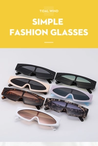 Close-up of trendy wide-leg sunglasses in various colors with seamless flat top frames