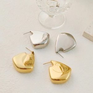 Vintage 18K gold and silver fan-shaped hollow hoop earrings with a polished finish