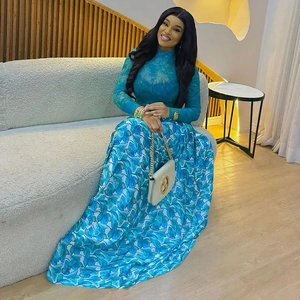 Slim-fit high neck floral print dress with long sleeves in blue and green tones