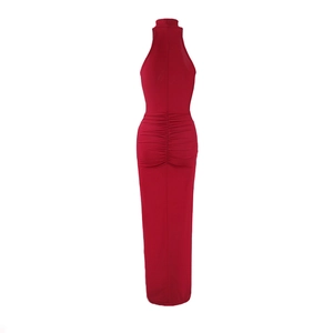 Rear view of a red bodycon dress featuring elegant back ruching and halter neckline details