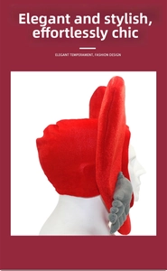 Detail showing red plush heart-shaped cupid hat with creative ear and hand decorations