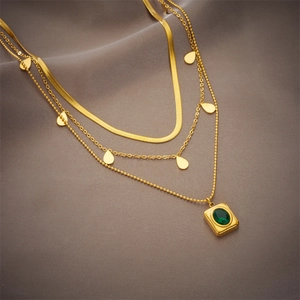 French vintage multi-layer titanium necklace with emerald pendant and gold teardrop charms